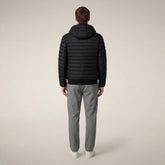 Piumino animal free con cappuccio uomo Donald Nero | Save The Duck