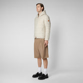 Man's animal free hooded puffer jacket Donald in rainy beige - New season's heroes | Save The Duck