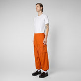 Unisex trousers Tru in amber orange - Man's Trousers | Save The Duck