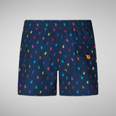 Boys' swimwear Getu in rainbow ducks on navy blue | Save The Duck