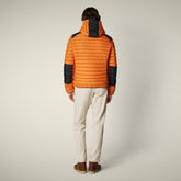 Piumino uomo animal free Jelep arancione ambra - FW25 MAN COLLECTION | Save The Duck
