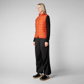 Woman's quilted gilet Charlotte in ginger orange - Halloween | Save The Duck