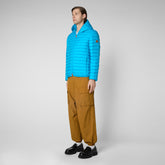 Man's animal free puffer jacket Helios in fluo blue | Save The Duck