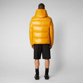 Man's animal free hooded puffer jacket Edgard in beak yellow - Shiny selection | Save The Duck