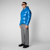 Man's animal free hooded puffer jacket Edgard in blue berry - Shiny selection | Save The Duck