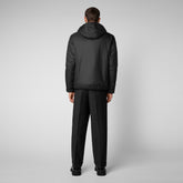 Man's animal free hooded puffer jacket Allium in black - Black Man | Save The Duck